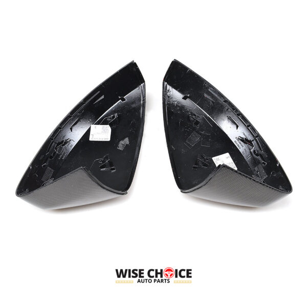 Audi 8V 8V.5 Carbon Fiber Mirror Covers - Side view of sleek and sporty carbon fiber mirror covers on an Audi car