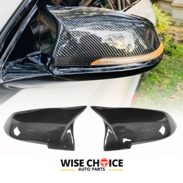 BMW Carbon Fiber Mirror Covers attached to a BMW Sedan Series vehicle, showcasing its glossy finish and deep pattern.