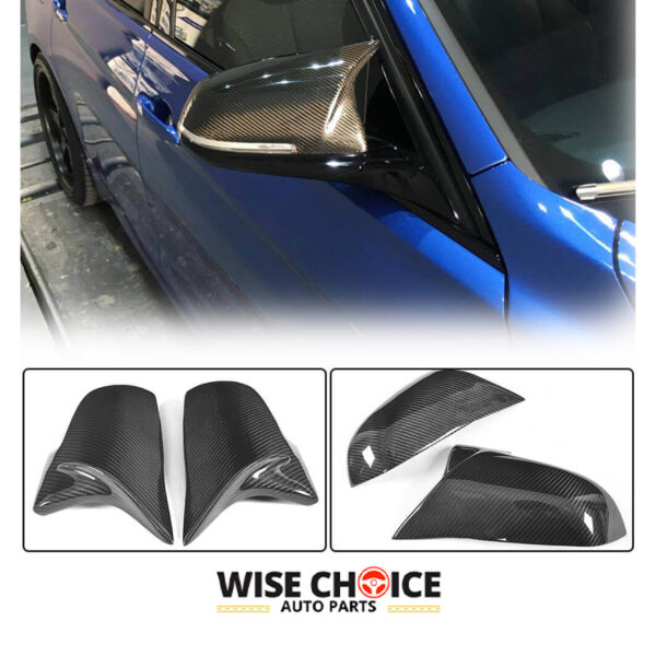 BMW Carbon Fiber Mirror Covers attached to a BMW Sedan Series vehicle, showcasing its glossy finish and deep pattern.