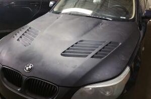 E60 GTR Fiberglass Hood with bolt-on design and gray primer finish for 2004-2008 BMW E60.