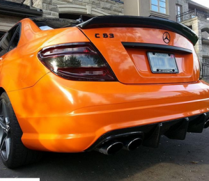 High-quality image of the 2008-2011 C63 Carbon Bigfin Diffuser showcasing its sleek design and real carbon fiber material.