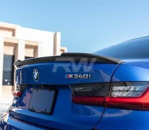 CG20 Carbon Fiber Spoiler installed on a 2019-2024 model car, showcasing real carbon fiber and clear coat finish.