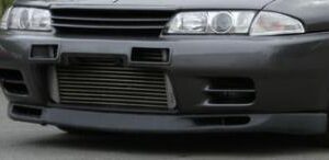 R32 Skyline GTR OEM Style Front Bumper with Detachable Lip in white gelcoat finish.