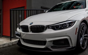 2014-2019 F32 M Performance Carbon Fiber Front Lip with clear coat finish.