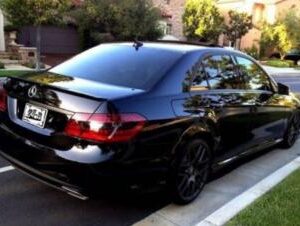 Glossy black W212 AMG Look spoiler for 2010-2012 Mercedes-Benz E-Class sedan.