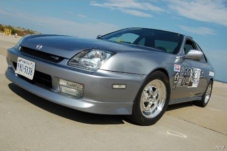 1997-2001 Honda Prelude HFP Aero Front Lip in Ultraflex, Flat Black, showcasing its design and finish.