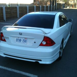 A flat black Reverb Style Rear Lip designed for 2001-2005 Honda Civic 2DR and 4DR models, showcasing its sleek and aerodynamic profile.