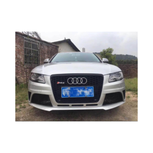 A sleek 2009-2012 RS4 Conversion Bumper for Audi, showcasing its unpainted poly plastic design