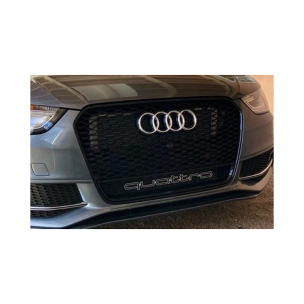 A4/S4 2013-2016 B8.5 All Black Quattro RS4 Grille installed on an Audi, showcasing its sleek design and customizable logo.