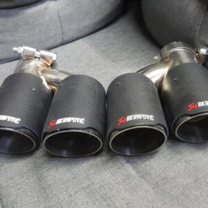 Akrapovic Quad Conversion Carbon Tip Set, sold as pair, showcasing high-quality carbon fiber construction.