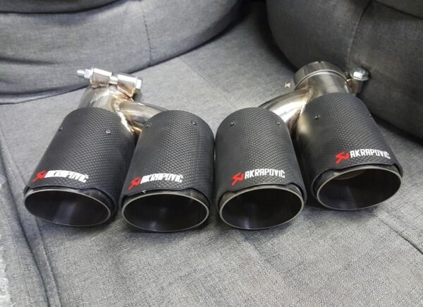 Akrapovic Quad Conversion Carbon Tip Set, sold as pair, showcasing high-quality carbon fiber construction.