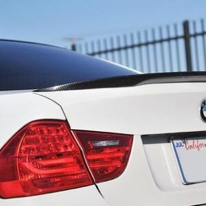 E90 Performance Carbon Spoiler for 2006-2011 BMW 4DR models, showcasing its sleek design and UV clear coat finish