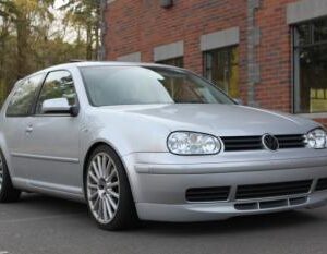 1999-2005 Golf 20th Anniversary Front Lip in flat black ultraflex, showcasing its sleek design and direct fit for easy installation.