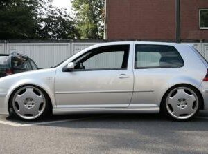 1999-2005 Golf 20th Anniversary Side Skirts in Flat Black Ultraflex installed on a car